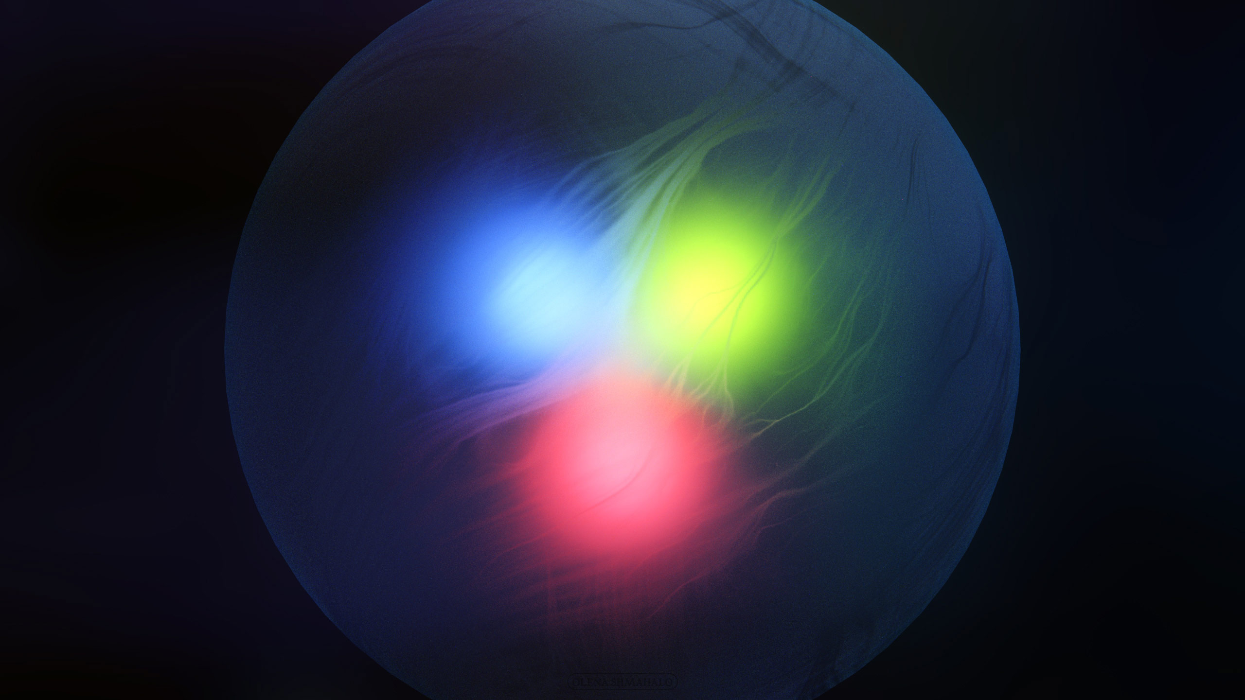 A proton particle on a dark background.