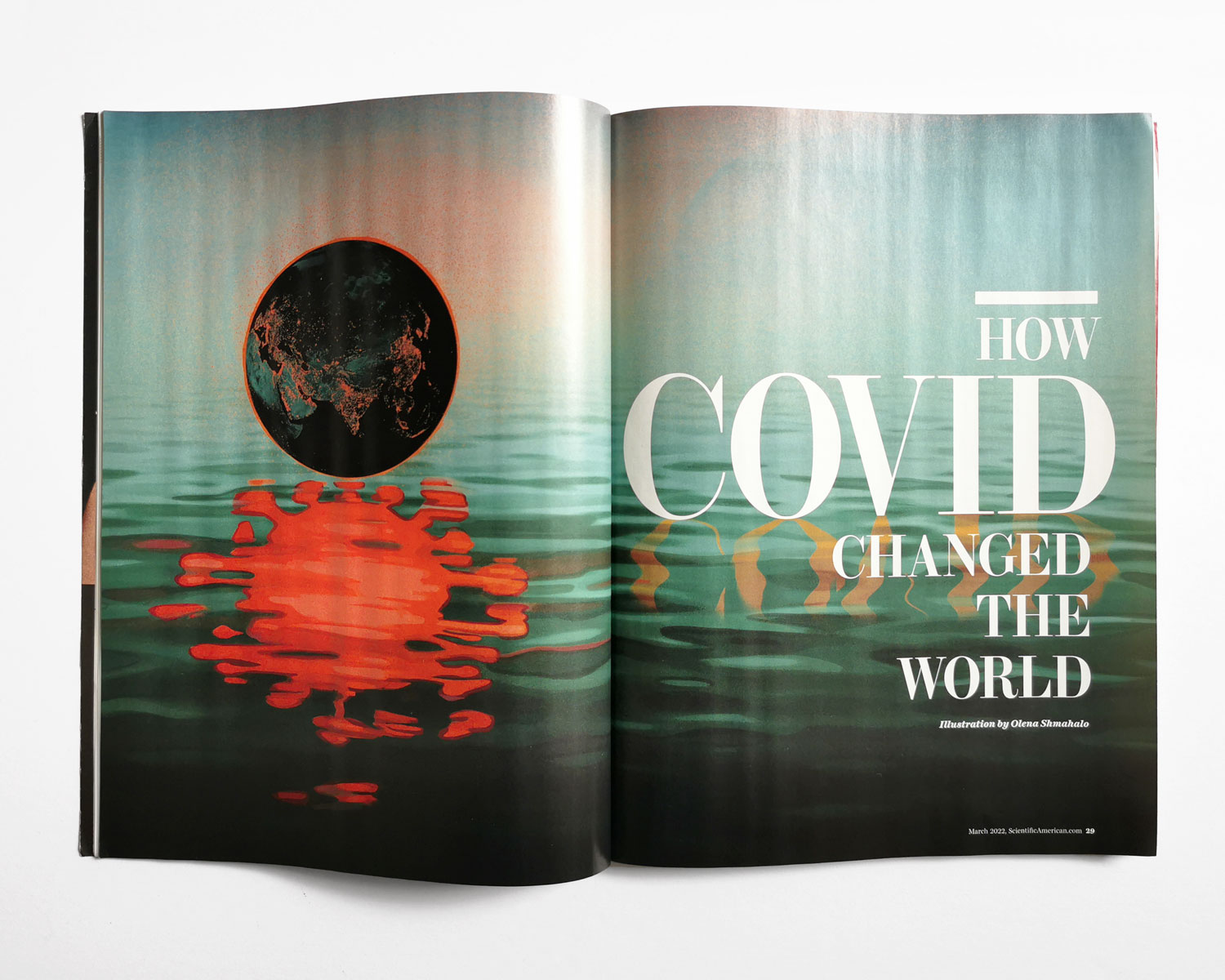 Photo of an interior spread in Scientific American: How COVID Changed the World. Painting of a black planet earth with red dots denoting cities, hovering over dark water that's reflecting the earth as a bright red coronavirus.
