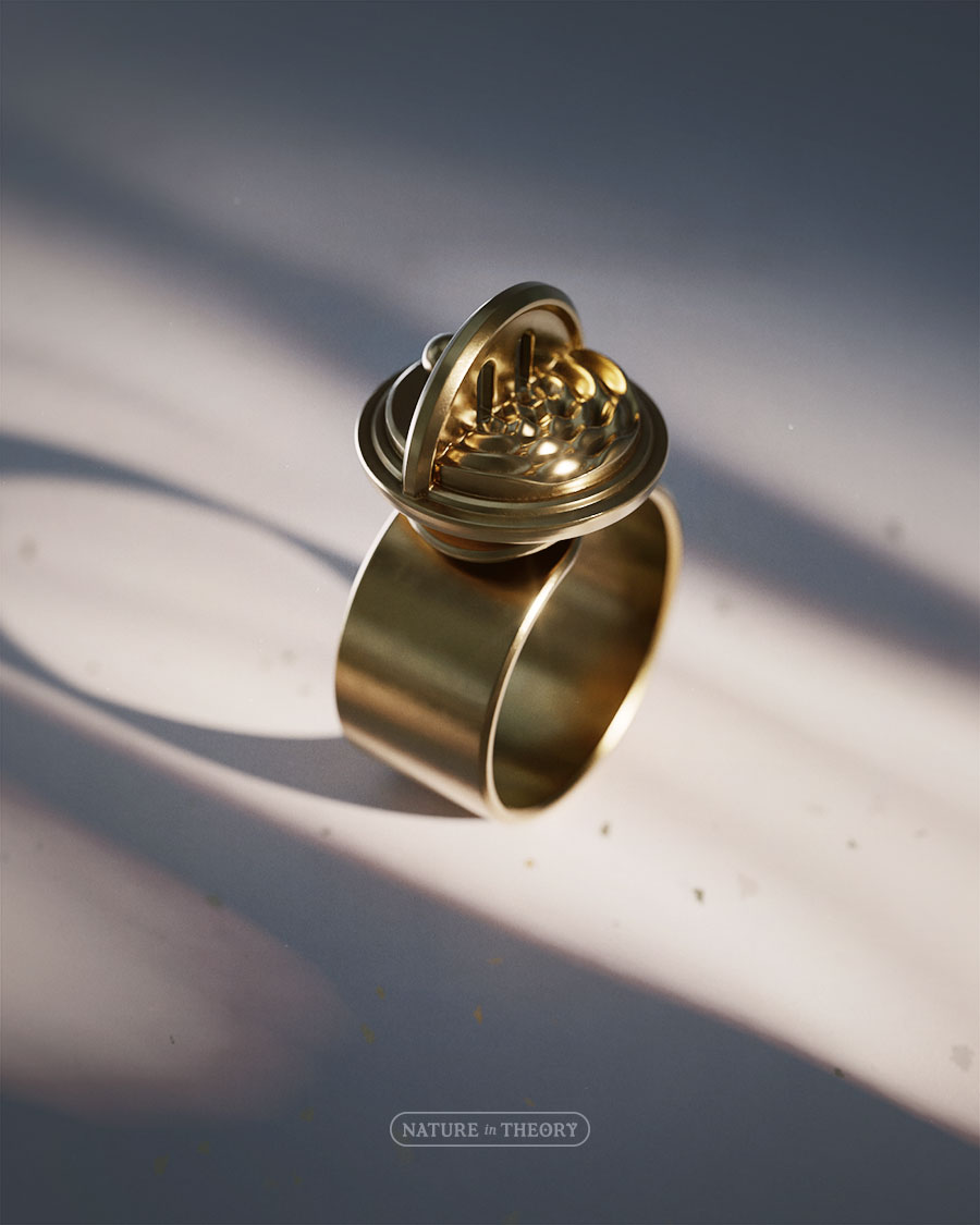 3D render of brass jewelry: wrap ring featuring a particle and wave diffraction separated by a double-slit screen (as in the famous quantum physics experiment). Original design © Olena Shmahalo / Nature in Theory